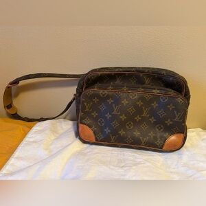 Louis Vuitton monogrammed messenger crossbody bag